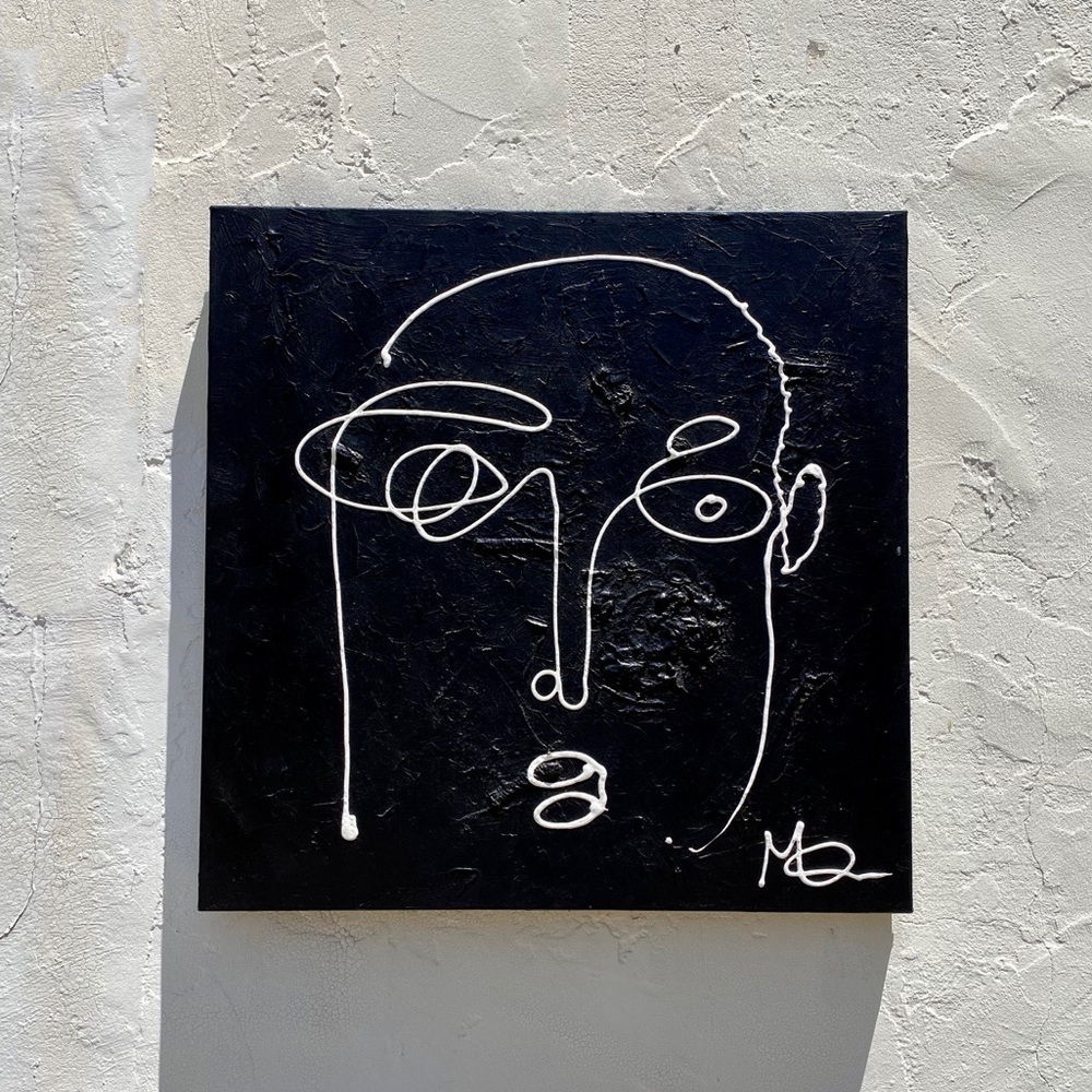 Big black bg w white line work single face design.